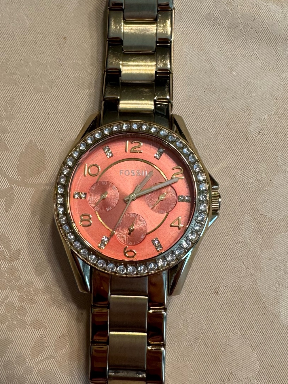 Fossil Gold-Tone Watch with Pink Coral Dial and Crystal Bezel